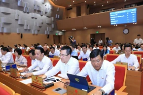 100% đại biểu Hội đồng nhân dân thành phố Hà Nội biểu quyết thông qua Nghị quyết Về việc tán thành chủ trương sắp xếp đơn vị hành chính cấp xã. 