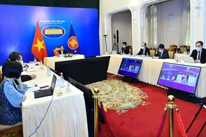 Bộ trưởng Ngoại giao Bùi Thanh Sơn tham dự Hội nghị từ đầu cầu Hà Nội. (Ảnh do báo Thế giới và Việt Nam cung cấp)