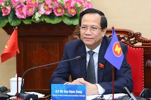 Bộ trưởng Đào Ngọc Dung dự hội nghị theo hình thức trực tuyến (Ảnh: Molisa).