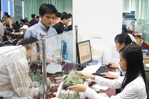 Thị trường chứng khoán Việt Nam đang gặp khó khăn do các cơ chế. Ảnh: NAM ANH
