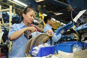 Sản xuất và lắp ráp xe máy tại Công ty TNHH Piaggio Việt Nam (Khu công nghiệp Bình Xuyên, tỉnh Vĩnh Phúc). Ảnh | TRẦN HẢI