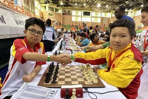 Khương Duy và Nam Kiệt giành hai ngôi vị dẫn đầu Giải Cờ vua trẻ thế giới lứa U12 .