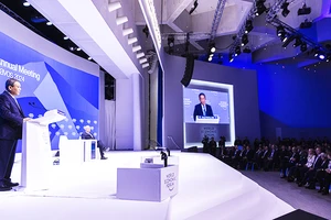 Phiên khai mạc WEF tại Davos. Ảnh: REUTERS