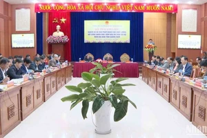 Quang cảnh hội thảo khoa học “Nhiệm vụ và giải pháp nâng cao chất lượng đời sống nhân dân, bảo đảm an sinh xã hội trên địa bàn tỉnh Quảng Nam”.