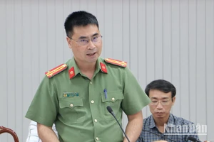 Thượng tá Nguyễn Mạnh Toàn, Phó Giám đốc Công an tỉnh Đồng Nai báo cáo tại cuộc họp.