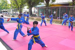 Các võ sinh Vovinam tập duyệt chuẩn bị cho Liên hoan Võ thuật quốc tế Thành phố Hồ Chí Minh 2024.