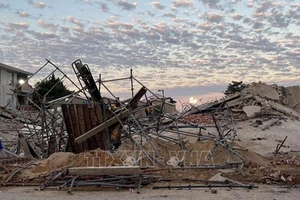 Hiện trường vụ sập tòa nhà ở thành phố George, Nam Phi ngày 7/5/2024. Ảnh: AFP/TTXVN