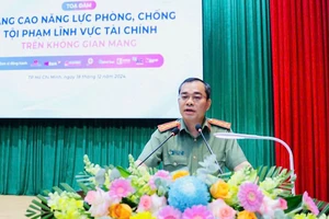 Đại tá Lê Quang Đạo, Phó Giám đốc Công an Thành phố Hồ Chí Minh phát biểu khai mạc tọa đàm.