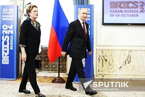 Tổng thống Nga V.Putin (phải) tham dự Hội nghị thượng đỉnh BRICS tại Kazan. Ảnh: SPUTNIK