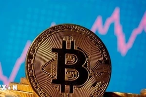 Đồng tiền kỹ thuật số Bitcoin. (Ảnh: REUTERS/TTXVN)