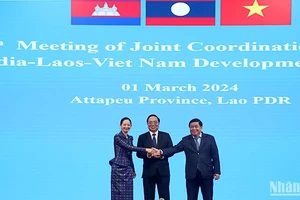 Các vị Bộ trưởng, Chủ tịch Ủy ban Điều phối chung Khu vực Tam giác phát triển Campuchia-Lào-Việt Nam tại Hội nghị. Ảnh: TRỊNH DŨNG