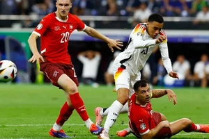 Hòa 1-1 trước Thụy Sĩ, nhưng Đức (áo trắng) được dự đoán sẽ vượt qua Đan Mạch ở vòng 16 đội.