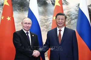 Chủ tịch Trung Quốc Tập Cận Bình (phải) và Tổng thống Nga Vladimir Putin tại cuộc gặp ở Bắc Kinh ngày 16/5/2024. (Ảnh: AFP/TTXVN)