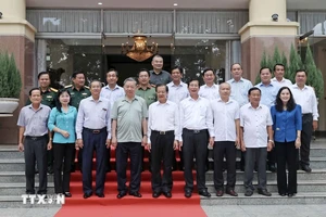 Chủ tịch nước Tô Lâm với cán bộ chủ chốt tỉnh An Giang. (Ảnh: Nhan Sáng/TTXVN)