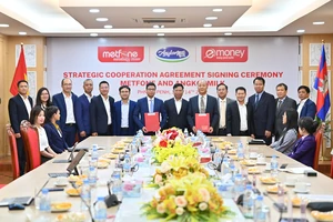 Lễ ký thỏa thuận hợp tác giữa hai doanh nghiệp lớn của Việt Nam tại Campuchia.