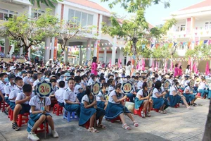Các em học sinh Trường Tiểu học Võ Thị Sáu, thành phố Tam Kỳ (Quảng Nam) bước vào năm học mới.