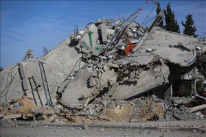 Tòa nhà bị phá hủy trong cuộc xung đột Hamas - Israel tại Deir el-Balah, Dải Gaza, ngày 1/3/2024. (Ảnh: THX/TTXVN)