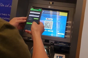 Dịch vụ rút tiền qua mã QR tại cây ATM. (Ảnh: nhandan.vn)