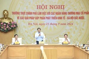 Thủ tướng Phạm Minh Chính chủ trì Hội nghị Thường trực Chính phủ làm việc với các ngân hàng thương mại cổ phần (Ảnh: Trần Hải). 