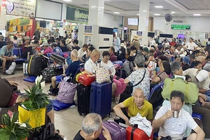 Tại Ga Sài Gòn, lượng khách đi tàu tăng vọt. (Ảnh QUÝ HIỀN)