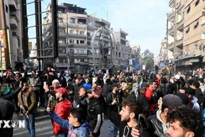 Người dân tại thủ đô Damascus, Syria ngày 8/12/2024. (Ảnh: THX/TTXVN)