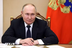 Tổng thống Nga Vladimir Putin tại cuộc họp trực tuyến ở Moskva. (Ảnh: AFP/TTXVN)
