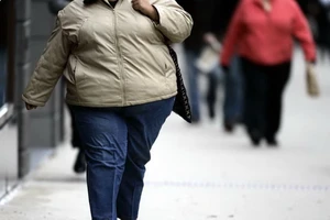 Một phụ nữ bị mắc bệnh béo phì. (Ảnh: AFP/TTXVN )