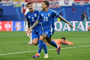 Italia gỡ hòa 1-1 ở phút 90+8. (Ảnh: Reuters)