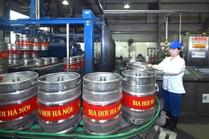 Dây chuyền sản xuất tại Nhà máy bia Hà Nội .(Ảnh ĐĂNG ANH)