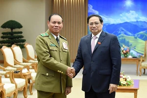 Thủ tướng Phạm Minh Chính tiếp Đại tướng Vilay Lakhamphong, Ủy viên Bộ Chính trị, Phó Thủ tướng, Bộ trưởng Công an Lào. (Ảnh: Trần Hải)