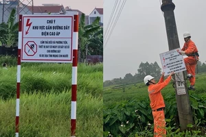 EVNHANOI lắp đặt hệ thống biển cảnh báo bảo vệ hành lang an toàn lưới điện. 