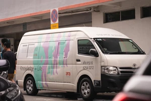 Một xe dịch vụ xét nghiệm lưu động đỗ tại cơ sở của AfA. Nguồn: AfA/Ricemedia.