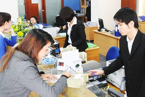 Các doanh nghiệp mong muốn được tiếp cận nguồn vốn ưu đãi để phát triển sản xuất. Ảnh: NGUYỆT ANH