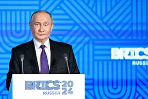 Tổng thống Nga Vladimir Putin trong cuộc họp báo trước lễ khai mạc hội nghị cấp cao BRICS.