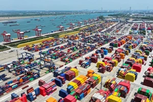 Xuất nhập khẩu hàng hóa của Trung Quốc ghi nhận đà đi lên. (Ảnh: Xinhua)