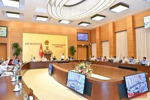 Ủy ban Thường vụ Quốc hội biểu quyết thông qua Nghị quyết thành lập thị xã Chơn Thành và thành lập các phường thuộc thị xã Chơn Thành, tỉnh Bình Phước. (Ảnh: DUY LINH)