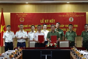 Lễ ký Quy chế phối hợp trong việc trao đổi, cung cấp thông tin tạm hoãn xuất cảnh bằng hình thức điện tử giữa Cục Thuế, Bộ Tài chính và Cục Quản lý xuất nhập cảnh, Bộ Công an.