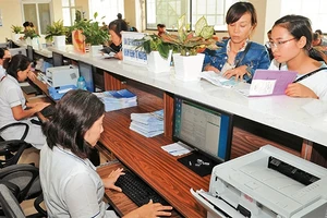 Ứng dụng công nghệ thông tin giúp tối ưu hóa quá trình quản lý bệnh án của bệnh nhân tại Bệnh viện K, Tân Triều (Hà Nội). Ảnh: ĐỨC ANH