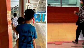 Hình ảnh cháu bé (trái) được đưa đến cấp cứu tại Bệnh viện Đa khoa tỉnh Nam Định. (Ảnh cắt từ video đăng trên mạng xã hội).