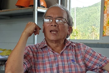 Tiến sĩ Nguyễn Hữu Lệ trao đổi với phóng viên Báo Nhân Dân.