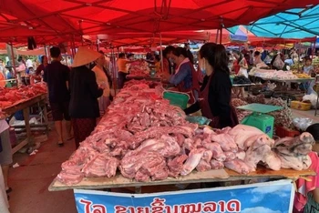Lào đang thực hiện các biện pháp bình ổn giá thịt lợn và các loại thực phẩm khác, ổn định cuộc sống người dân.