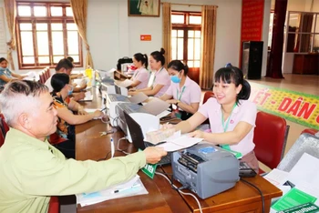 Điểm giao dịch của NHCSXH ở xã Nghi Phú, TP Vinh (Nghệ An).