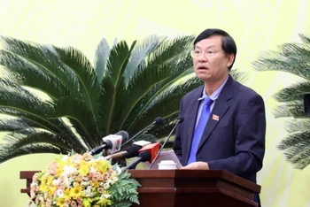 Chánh án Tòa án nhân dân Thành phố Hà Nội Nguyễn Hữu Chính phát biểu tại HĐND thành phố Hà Nội. 