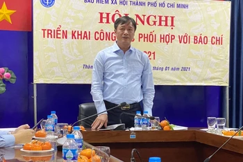 Giám đốc BHXH TP Hồ Chí Minh thông tin kết quả công tác năm 2020 và phương hướng nhiệm vụ năm 2021, tại Hội nghị sáng 21-1.