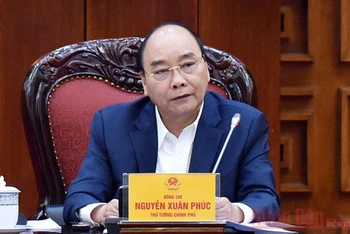 Thủ tướng Nguyễn Xuân Phúc chủ trì cuộc họp. (Ảnh: TRẦN HẢI)