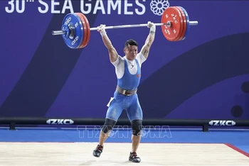Vận động viên cử tạ Kim Tuấn từng giành Huy chương Bạc ở hạng cân 61kg tại kỳ SEA Games 30.