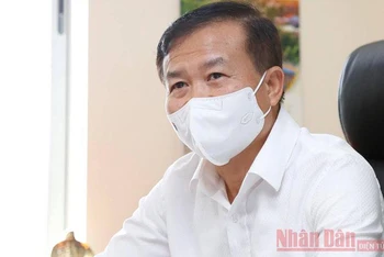 Đồng chí Nguyễn Quang Vinh, Giám đốc Quỹ vaccine phòng Covid-19. (Ảnh: QUỐC TUÂN)