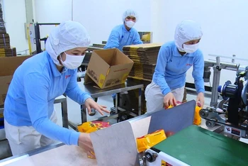 Công ty TNHH Thực phẩm Orion Vina (Khu công nghiệp Mỹ Phước 2, thị xã Bến Cát, tỉnh Bình Dương) thực hiện “ba tại chỗ” để hoạt động sản xuất và phòng, chống dịch.
