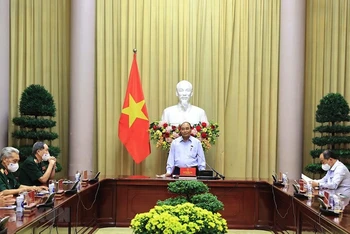 Chủ tịch nước Nguyễn Xuân Phúc phát biểu. (Ảnh: TTXVN)