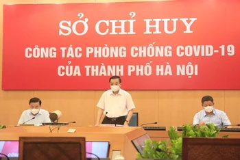 Chủ tịch UBND thành phố Hà Nội Chu Ngọc Anh chủ trì cuộc họp chiều 24-7.
